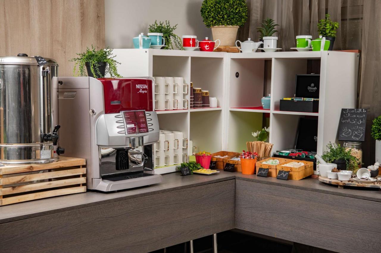 Park Inn By Radisson Makkah Aziziyah La La Mecca Esterno foto A coffee machine