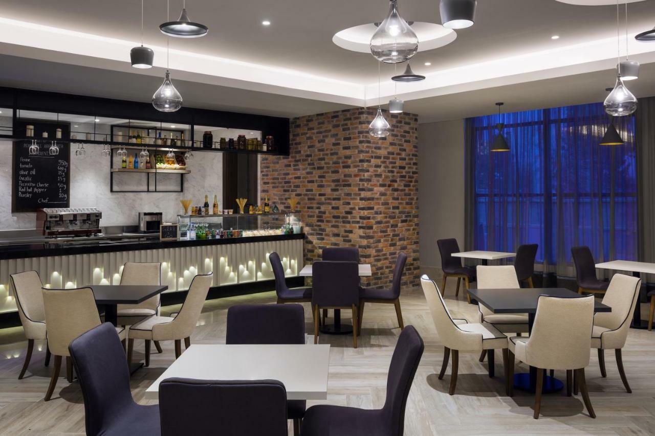 Park Inn By Radisson Makkah Aziziyah La La Mecca Esterno foto The hotel's restaurant